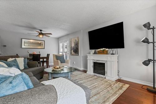 14 Ainsworth Street, Stoney Creek, ON - Indoor Photo Showing Living Room With Fireplace