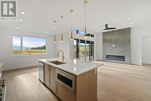 2543 Pinnacle Ridge Drive, West Kelowna, BC - Indoor Photo Showing Kitchen With Fireplace With Upgraded Kitchen