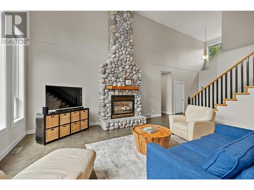 4805 Canyon Ridge Crescent, Kelowna, BC - Indoor Photo Showing Living Room With Fireplace