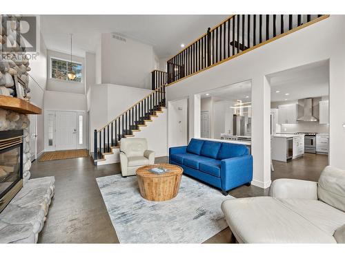 4805 Canyon Ridge Crescent, Kelowna, BC - Indoor Photo Showing Living Room With Fireplace