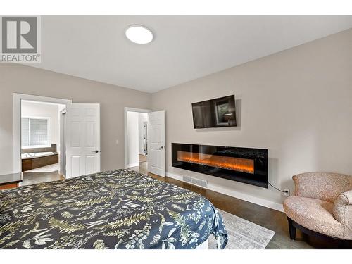 4805 Canyon Ridge Crescent, Kelowna, BC - Indoor Photo Showing Other Room With Fireplace