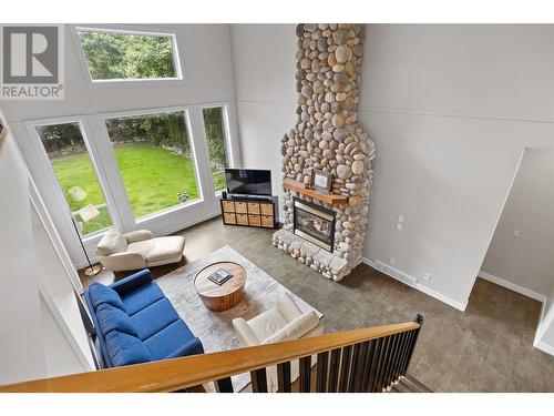 4805 Canyon Ridge Crescent, Kelowna, BC - Indoor Photo Showing Other Room With Fireplace