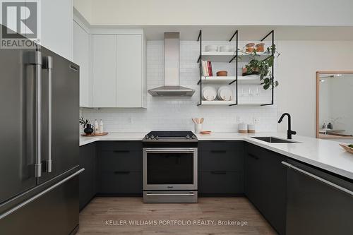 208 - 235 Medland Street, Toronto, ON - Indoor Photo Showing Kitchen With Upgraded Kitchen