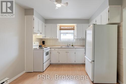17 Centennial Park Road W, Toronto, ON - Indoor Photo Showing Kitchen With Double Sink
