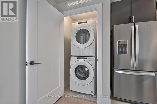 1208 - 3200 William Coltson Avenue, Oakville, ON - Indoor Photo Showing Laundry Room