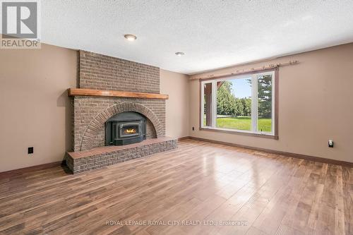 12297 Regional Rd 25, Halton Hills, ON - Indoor Photo Showing Living Room With Fireplace