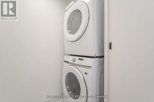 327 - 36 Zorra Street, Toronto, ON - Indoor Photo Showing Laundry Room