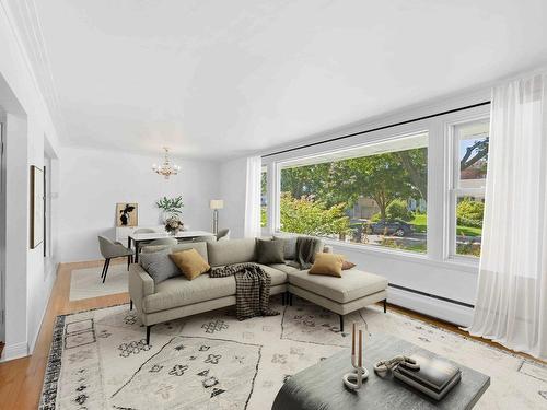 Vue d'ensemble - 870 Ch. Marlboro, Mont-Royal, QC - Indoor Photo Showing Living Room With Fireplace