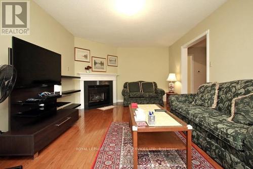 3395 Cajun Crescent, Mississauga, ON - Indoor Photo Showing Living Room With Fireplace