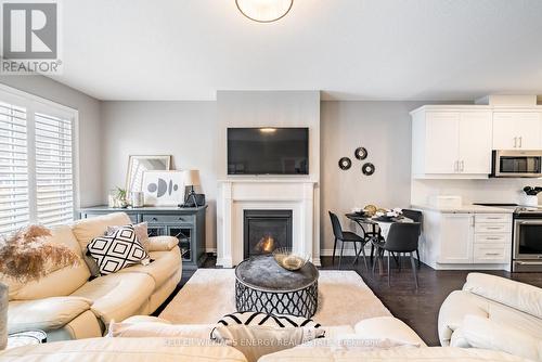 23 Spryfield Trail, Clarington, ON - Indoor Photo Showing Living Room With Fireplace