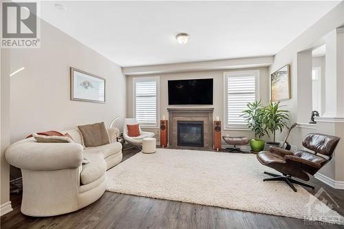 560 Chimney Corner Terrace, Ottawa, ON - Indoor Photo Showing Living Room With Fireplace