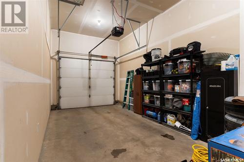 131 Plains Circle, Pilot Butte, SK - Indoor Photo Showing Garage