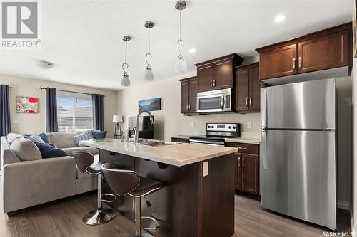 131 Plains Circle, Pilot Butte, SK - Indoor Photo Showing Kitchen With Upgraded Kitchen