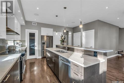 210 Mahabir Court, Saskatoon, SK - Indoor Photo Showing Kitchen With Double Sink With Upgraded Kitchen