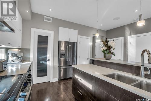 210 Mahabir Court, Saskatoon, SK - Indoor Photo Showing Kitchen With Double Sink