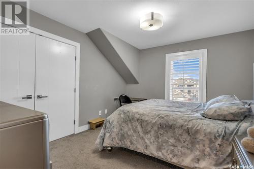 210 Mahabir Court, Saskatoon, SK - Indoor Photo Showing Bedroom