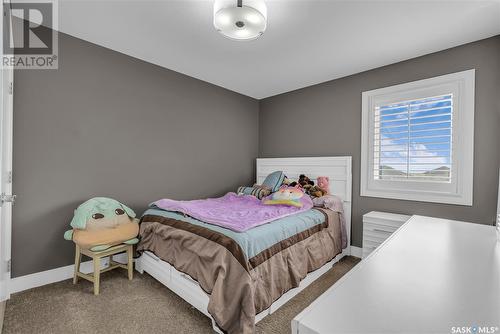 210 Mahabir Court, Saskatoon, SK - Indoor Photo Showing Bedroom