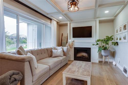 1349 Orchard Drive, Kelowna, BC - Indoor Photo Showing Living Room With Fireplace