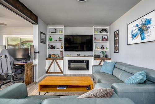 3312 6 Highway, Lumby, BC - Indoor Photo Showing Living Room With Fireplace