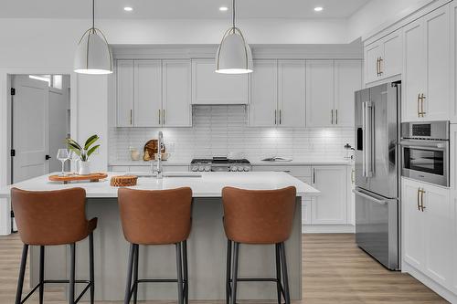 981 Lochness Street, Kelowna, BC - Indoor Photo Showing Kitchen With Double Sink With Upgraded Kitchen