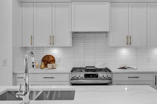 981 Lochness Street, Kelowna, BC - Indoor Photo Showing Kitchen With Double Sink With Upgraded Kitchen