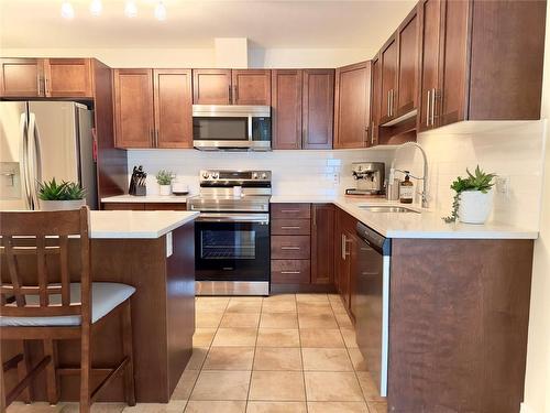 207-3350 Woodsdale Road, Lake Country, BC - Indoor Photo Showing Kitchen With Stainless Steel Kitchen With Upgraded Kitchen