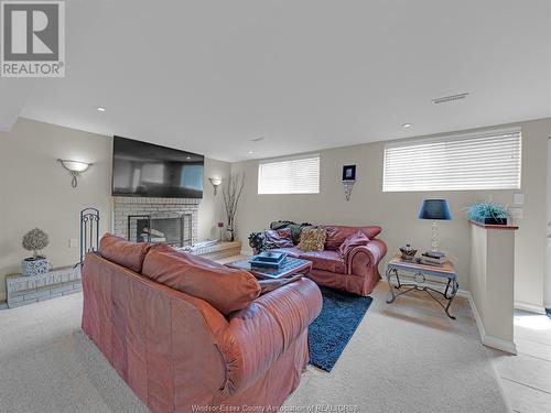 9590 Kerby, Windsor, ON - Indoor Photo Showing Basement With Fireplace