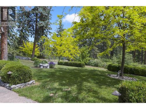 4163 Mahonia Drive S, Kelowna, BC - Outdoor With In Ground Pool With Deck Patio Veranda With Backyard