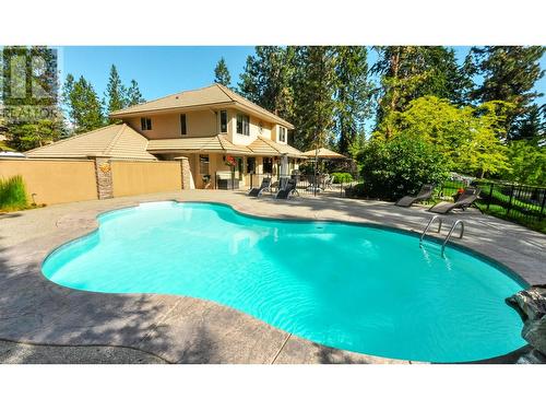 4163 Mahonia Drive S, Kelowna, BC - Outdoor With In Ground Pool With Backyard
