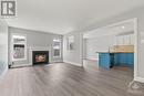 2651 Baynes Sound Way, Ottawa, ON  - Indoor Photo Showing Living Room With Fireplace 