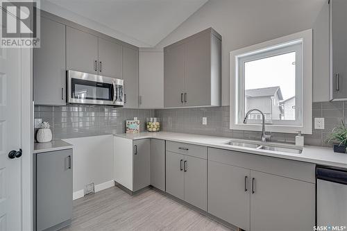 579 Myles Heidt Manor, Saskatoon, SK - Indoor Photo Showing Kitchen With Double Sink