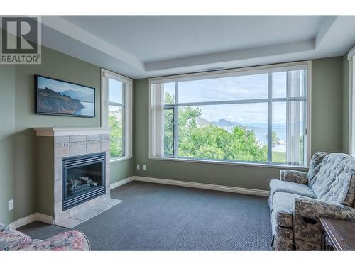 100 Lakeshore Drive Unit# 515, Penticton, BC - Indoor Photo Showing Living Room With Fireplace