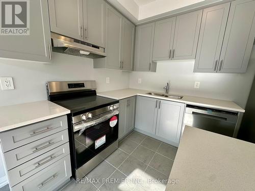 18 Keenan Street, Kawartha Lakes, ON - Indoor Photo Showing Kitchen With Double Sink