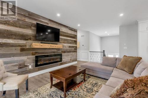 7 Duncan Drive, Kawartha Lakes, ON - Indoor Photo Showing Living Room With Fireplace