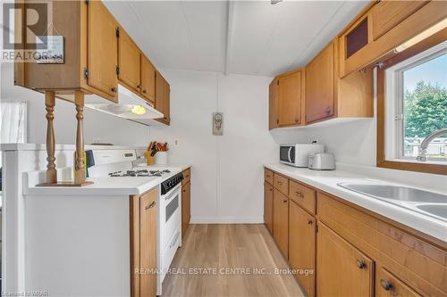 21 - 580 Beaver Creek Road, Waterloo, ON - Indoor Photo Showing Kitchen With Double Sink