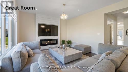 14 Lillian Way, Haldimand, ON - Indoor Photo Showing Living Room With Fireplace