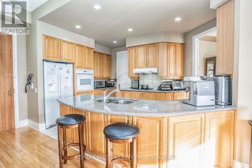 Tph6 - 25 Kingsbridge Garden Circle, Mississauga (Hurontario), ON - Indoor Photo Showing Kitchen With Double Sink