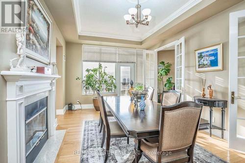 Tph6 - 25 Kingsbridge Garden Circle, Mississauga (Hurontario), ON - Indoor Photo Showing Dining Room With Fireplace