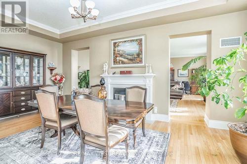 Tph6 - 25 Kingsbridge Garden Circle, Mississauga, ON - Indoor Photo Showing Dining Room With Fireplace