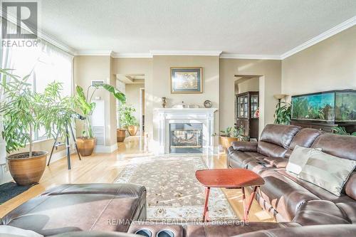 Tph6 - 25 Kingsbridge Garden Circle, Mississauga, ON - Indoor Photo Showing Living Room With Fireplace