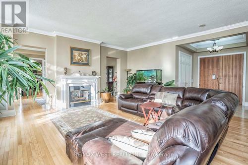 Tph6 - 25 Kingsbridge Garden Circle, Mississauga (Hurontario), ON - Indoor Photo Showing Living Room With Fireplace