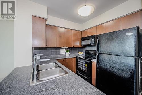 709 - 235 Sherway Gardens Road, Toronto, ON - Indoor Photo Showing Kitchen With Double Sink