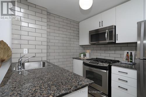 122 - 40 Carnation Avenue, Toronto, ON - Indoor Photo Showing Kitchen With Double Sink With Upgraded Kitchen