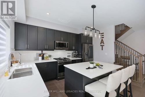 74 Leeson Street N, East Luther Grand Valley, ON - Indoor Photo Showing Kitchen With Stainless Steel Kitchen With Double Sink With Upgraded Kitchen