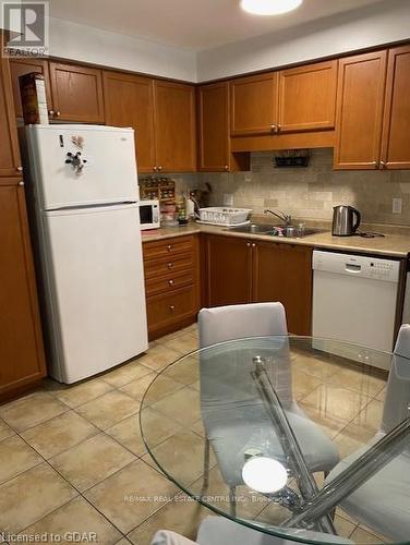 30 Revell Drive, Guelph, ON - Indoor Photo Showing Kitchen With Double Sink