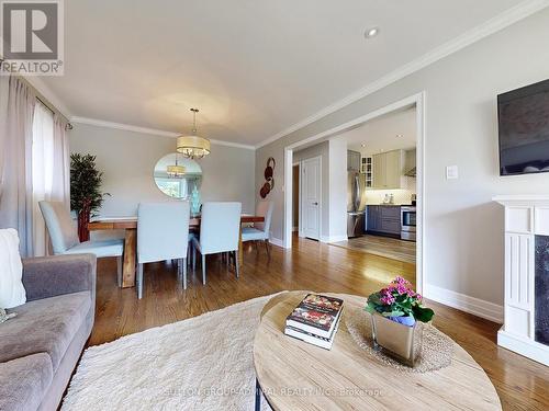 18 Ludstone Drive, Toronto, ON - Indoor Photo Showing Living Room With Fireplace