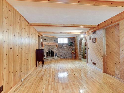 Family room - 29 Place Montmorency, Laval (Laval-Des-Rapides), QC - Indoor Photo Showing Other Room With Fireplace