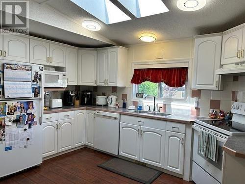 101 2454 Grants Frontage Road, Vanderhoof, BC - Indoor Photo Showing Kitchen With Double Sink