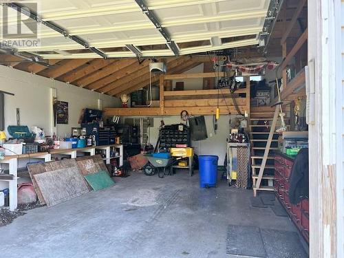 101 2454 Grants Frontage Road, Vanderhoof, BC - Indoor Photo Showing Garage