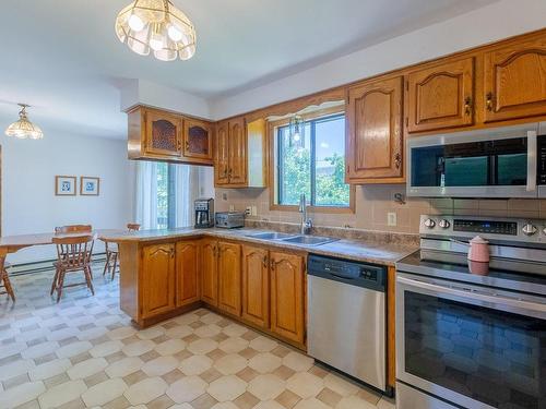 Kitchen - 8455 Av. San-Francisco, Brossard, QC - Indoor Photo Showing Kitchen With Double Sink